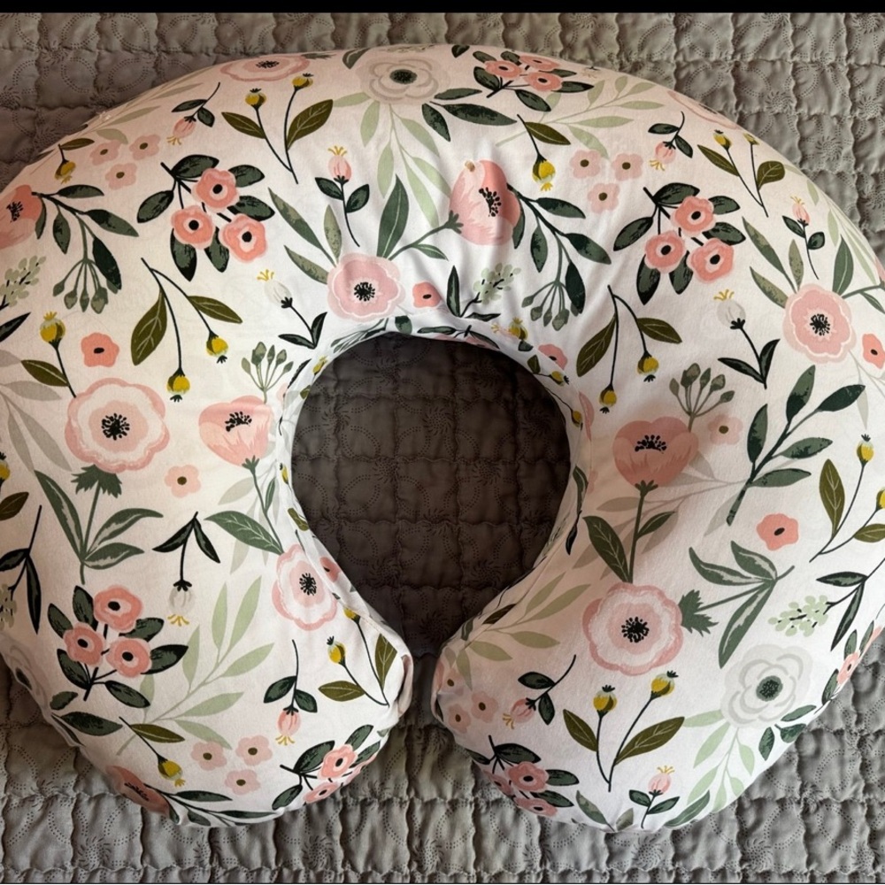 Boppy pillow for feedings and baby lounging.